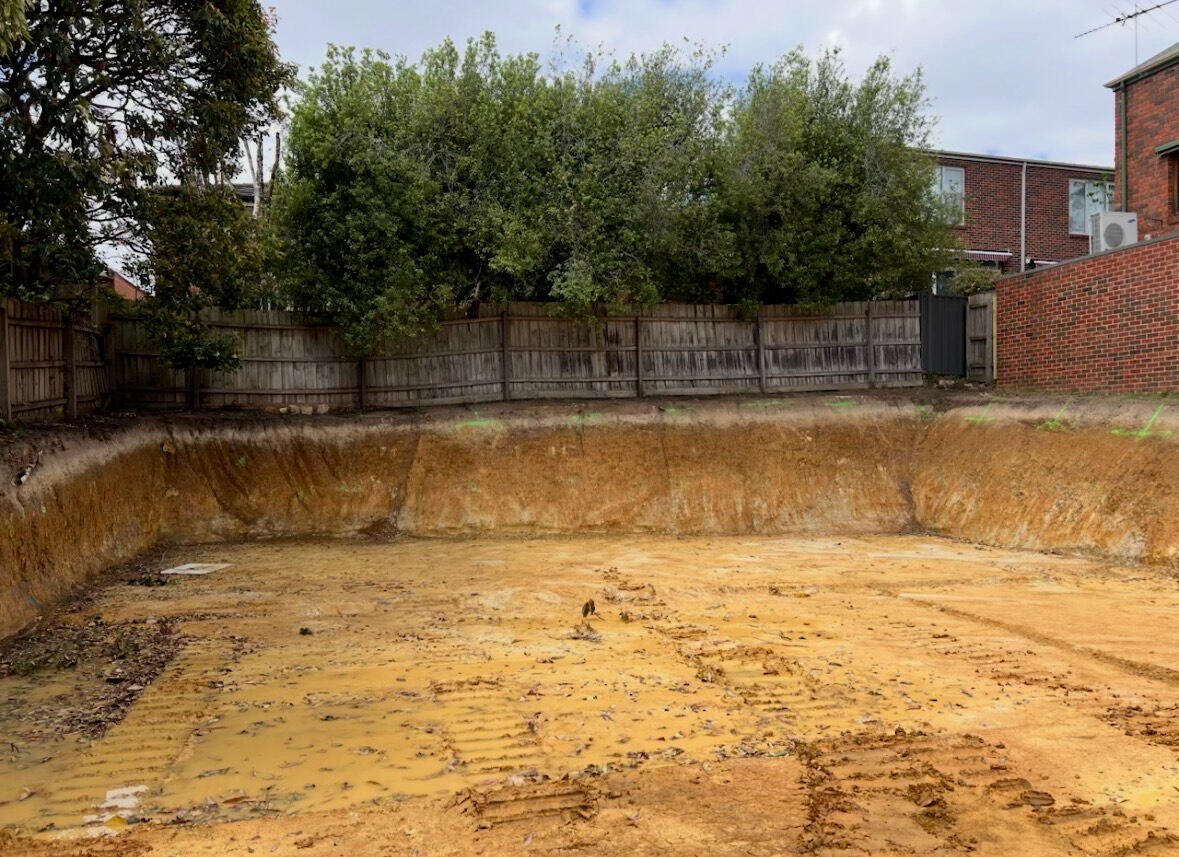 Residential Site Cut and Earthworks Melbourne Residential site cut completed in Melbourne showing cleared and levelled ground for new construction.